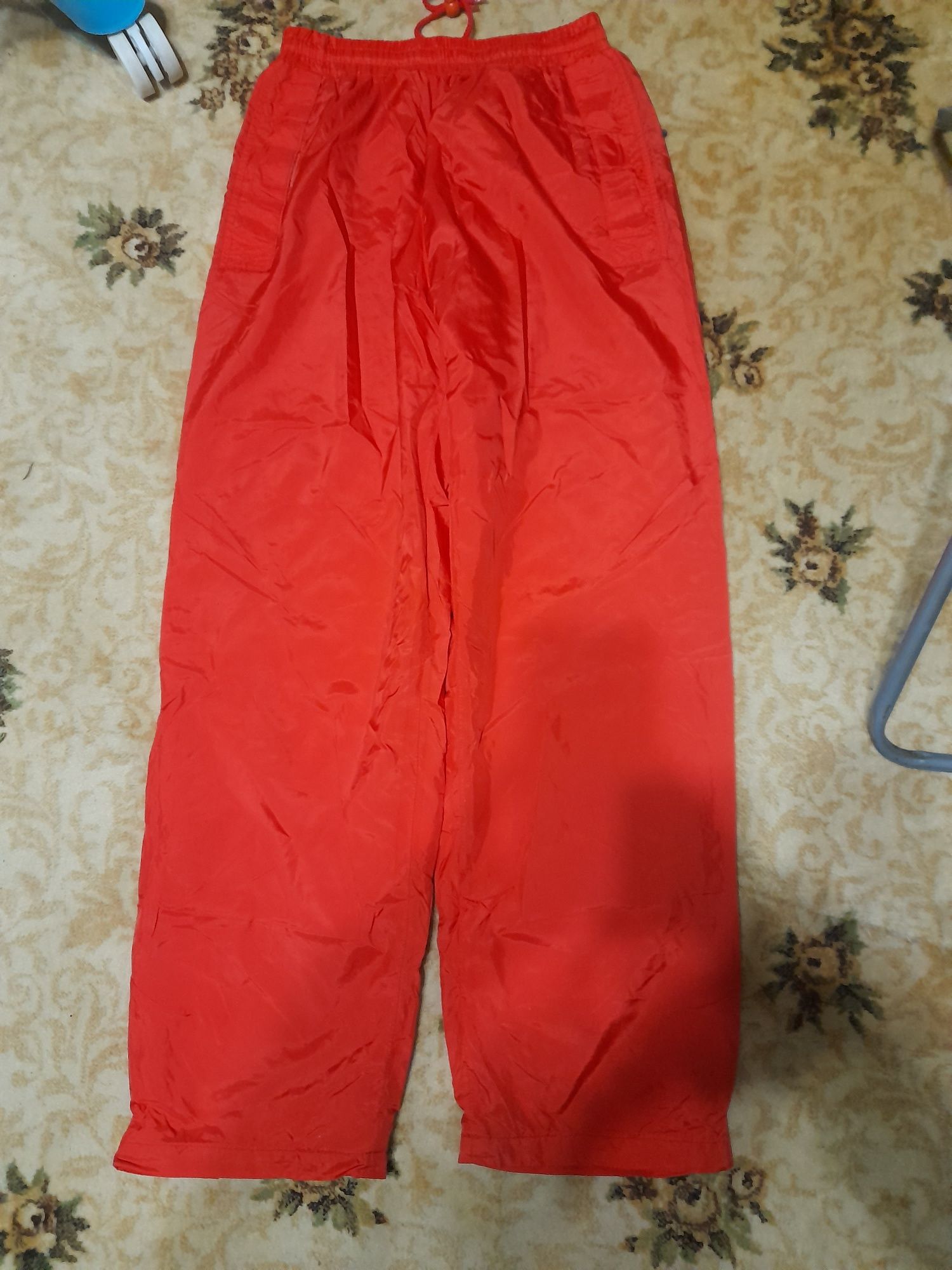 Спортивные брюки из болонья красного цвета размер 50