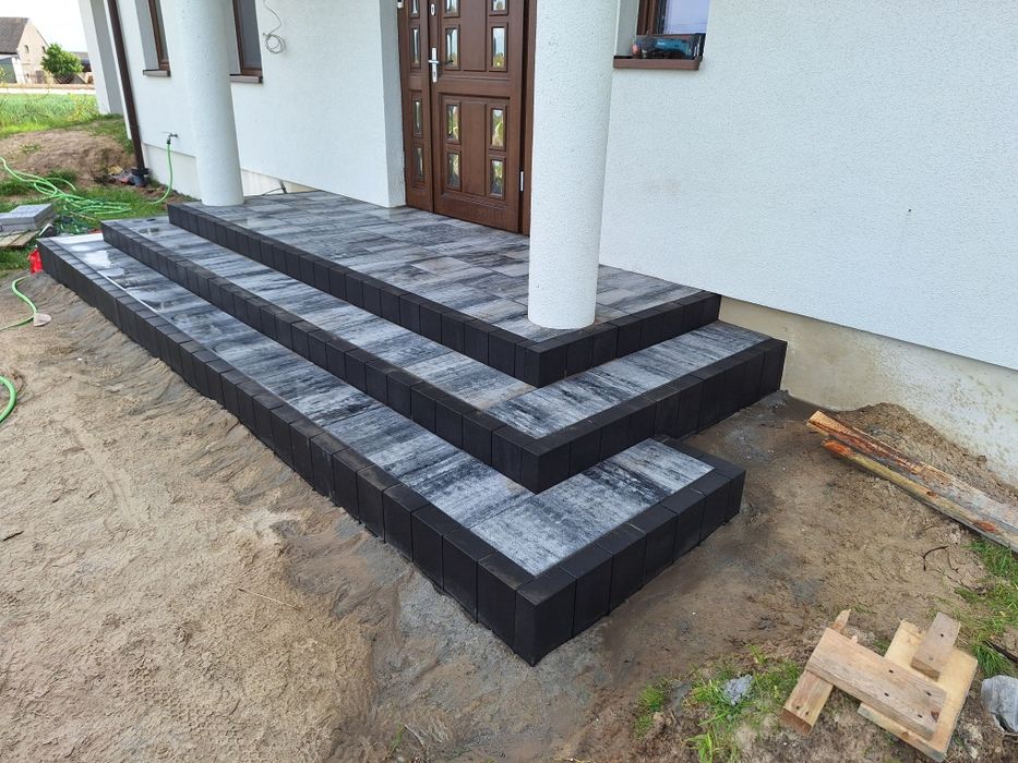 Koparka kostka brukowa ogrodzenia