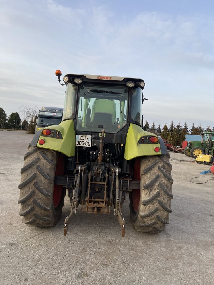 Claas Arion 410 z ładowaczem
