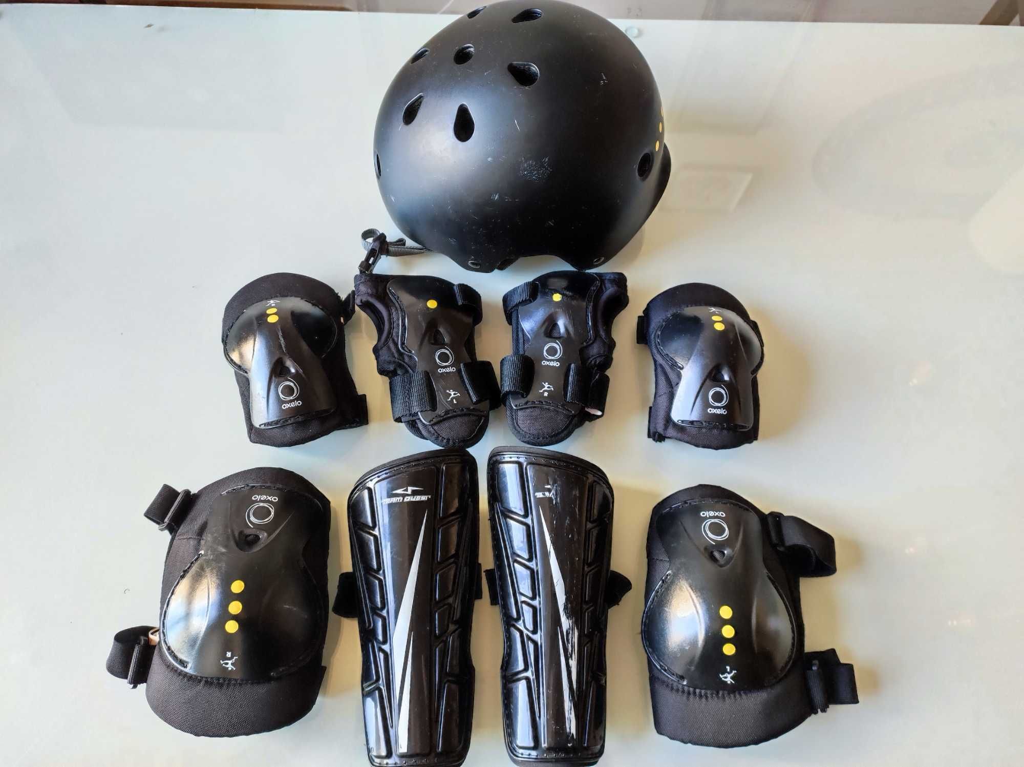 Conjunto de Capacete e proteções para criança em muito bom estado