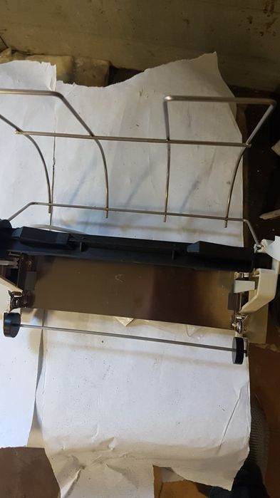 Пристрій подачі рулонного паперу в принтер