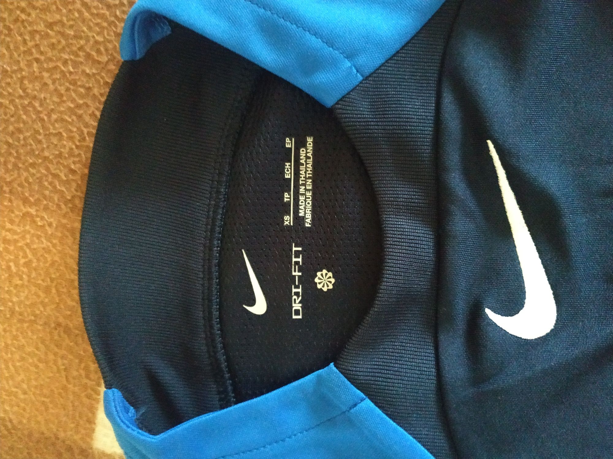 Футболка фирмы Nike.Цвет сине-голубой.
