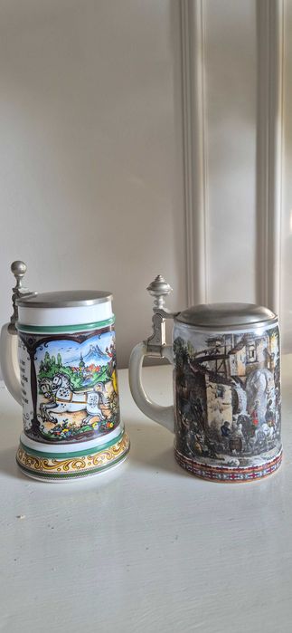 Dwa ceramiczne kufle do piwa z cynowymi przykrywkami