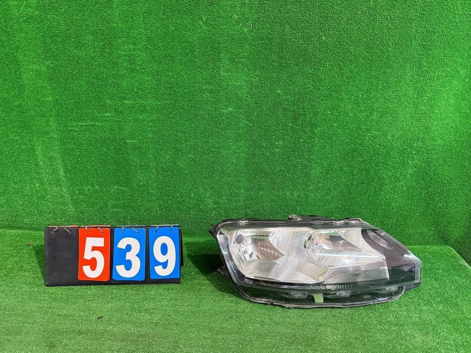 REFLEKTOR PRAWY SKODA RAPID nr539