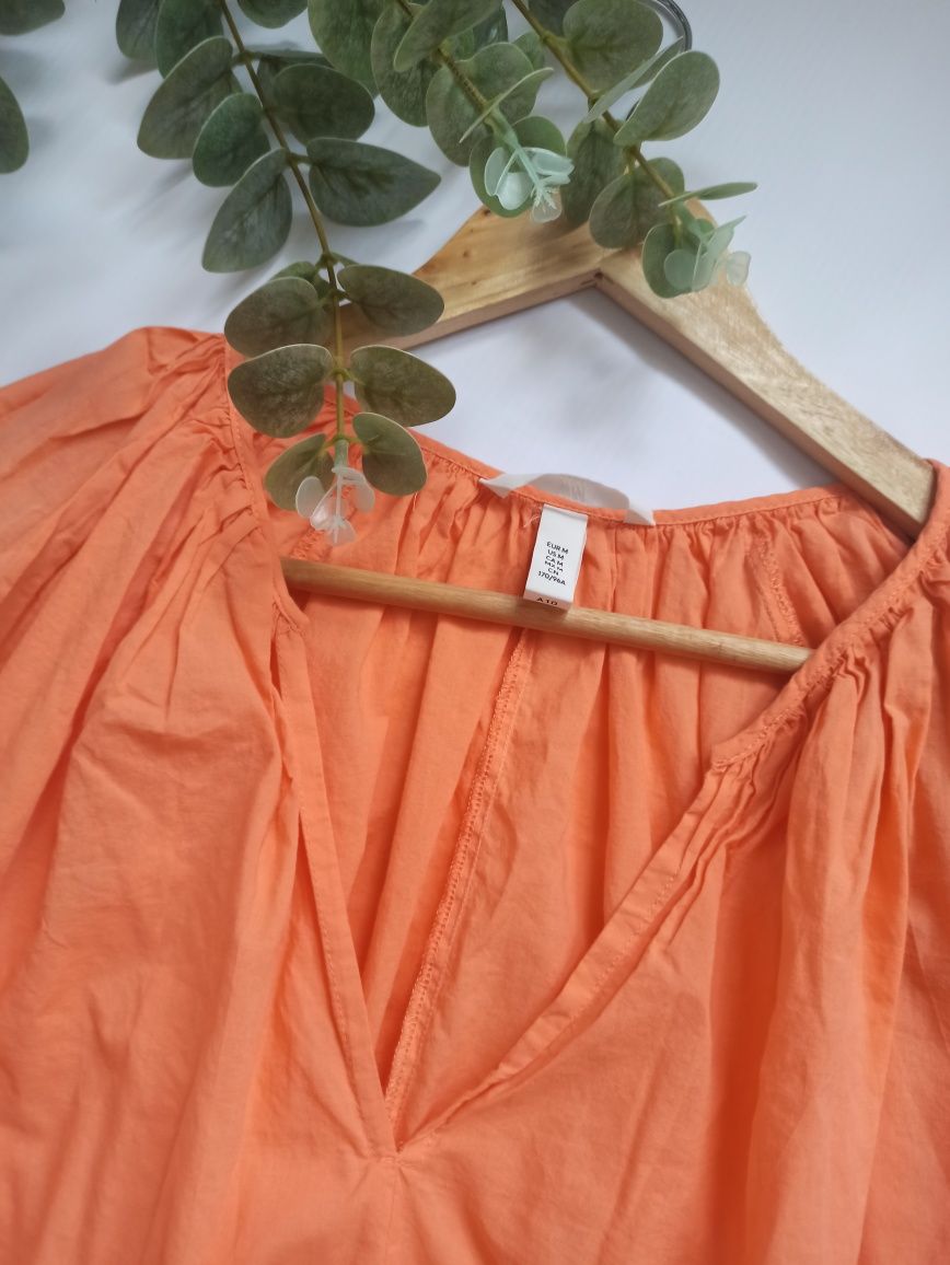 Pomaranczowa krótka lekka sukienka trapezowa z dekoltem w serek h&m 38