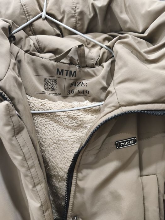 Зимове пальто для дівчинки.