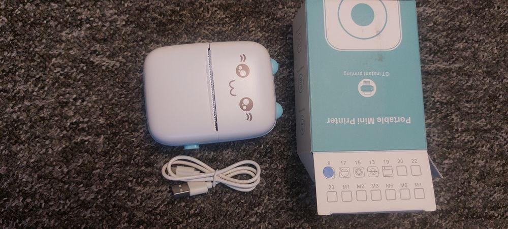 Mini drukarka do zdjęć z papierem w srod