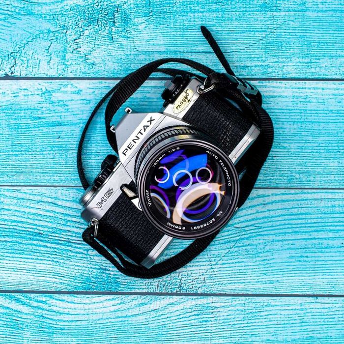 Pentax MG + Vivitar 135 mm f 2.8 + pasek