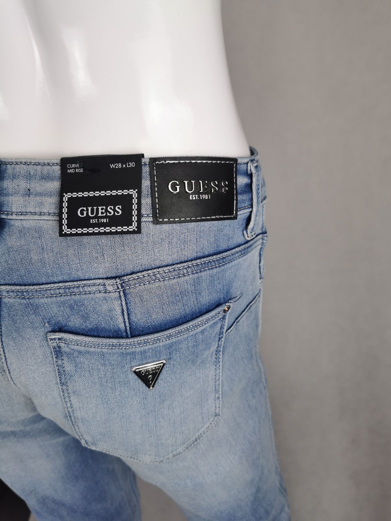 Nowe oryginalne spodnie jeansowe Guess W28 L30