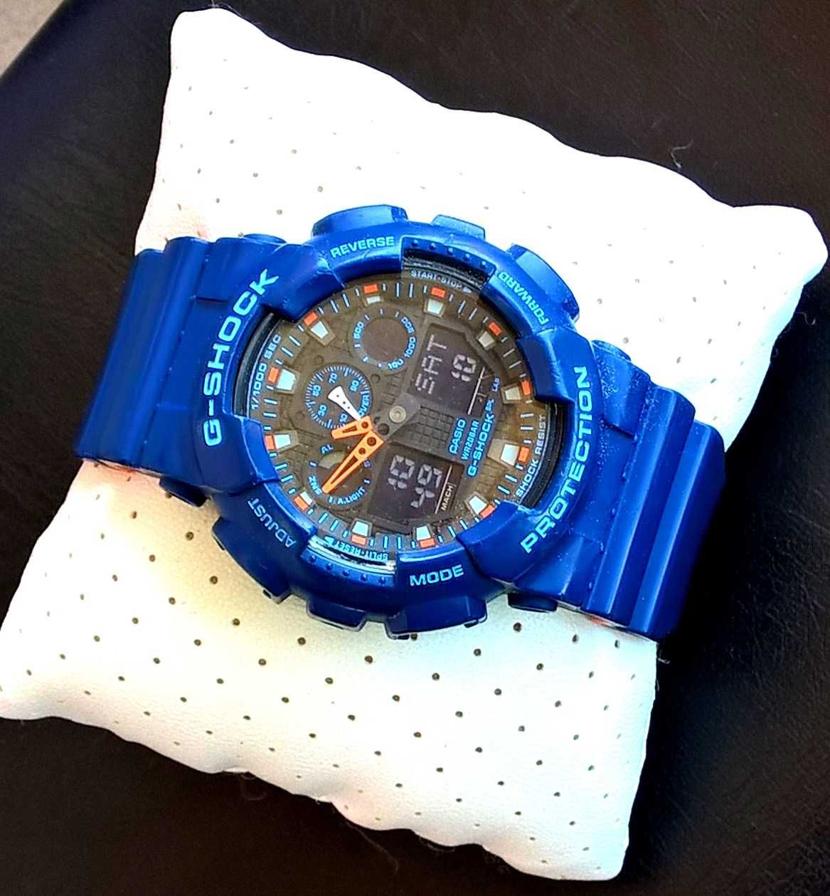 CASIO G-Shock GA-100L-2AER Niebiesko-Pomarańczowy