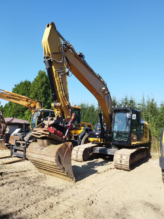 Koparka CAT 323E, gasienica CAT 950M