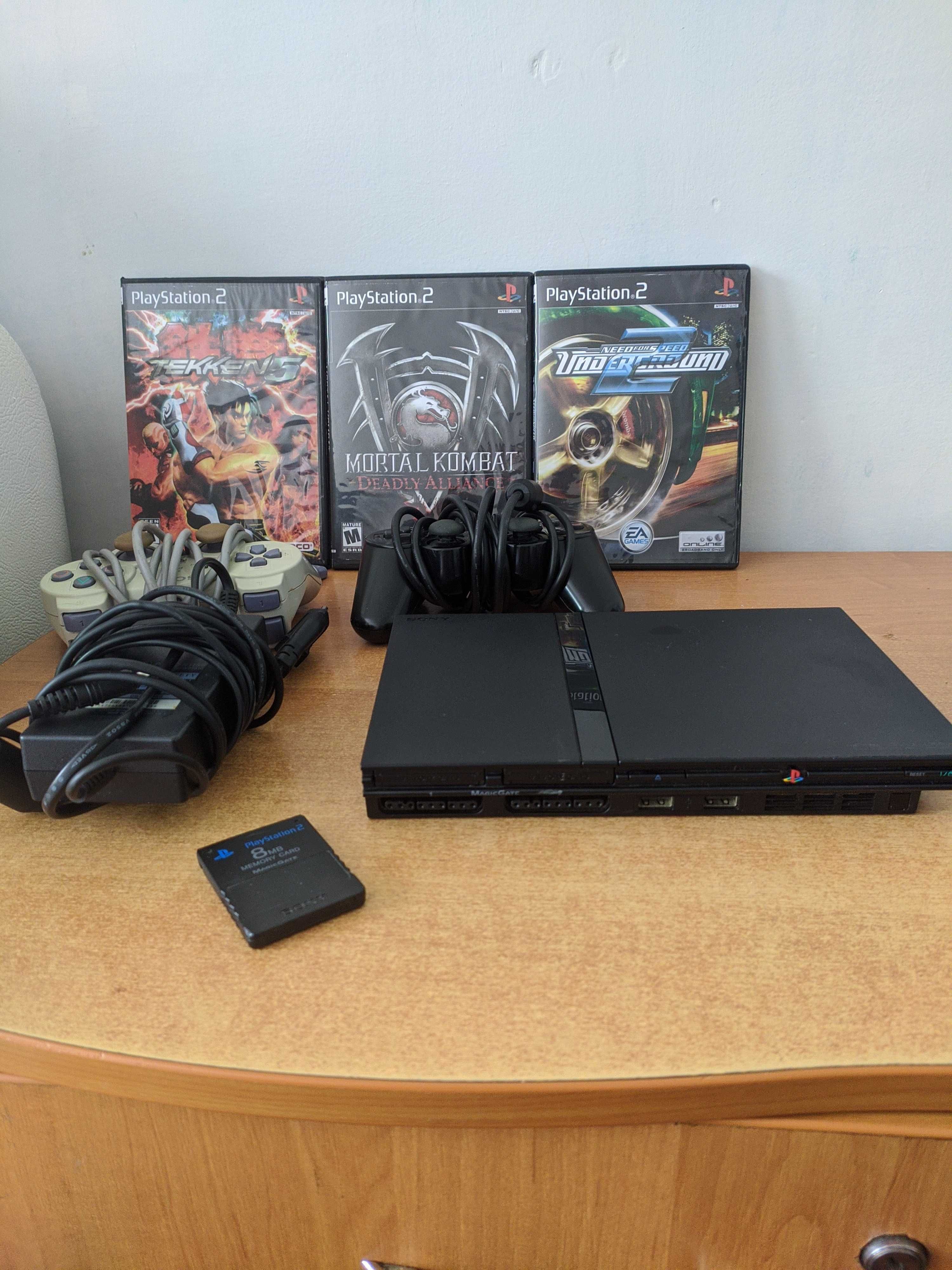 Sony PlayStation 2 +10 дисків, та 2 геймпада.