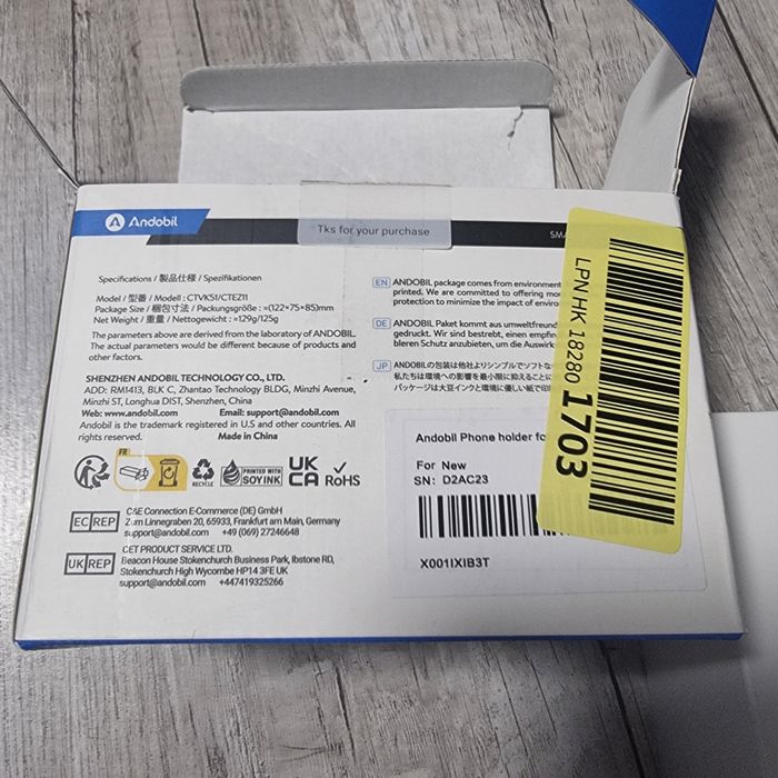 Uchwyt na telefon na kratkę