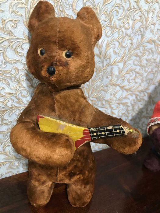 Плюшевый заводной мишка