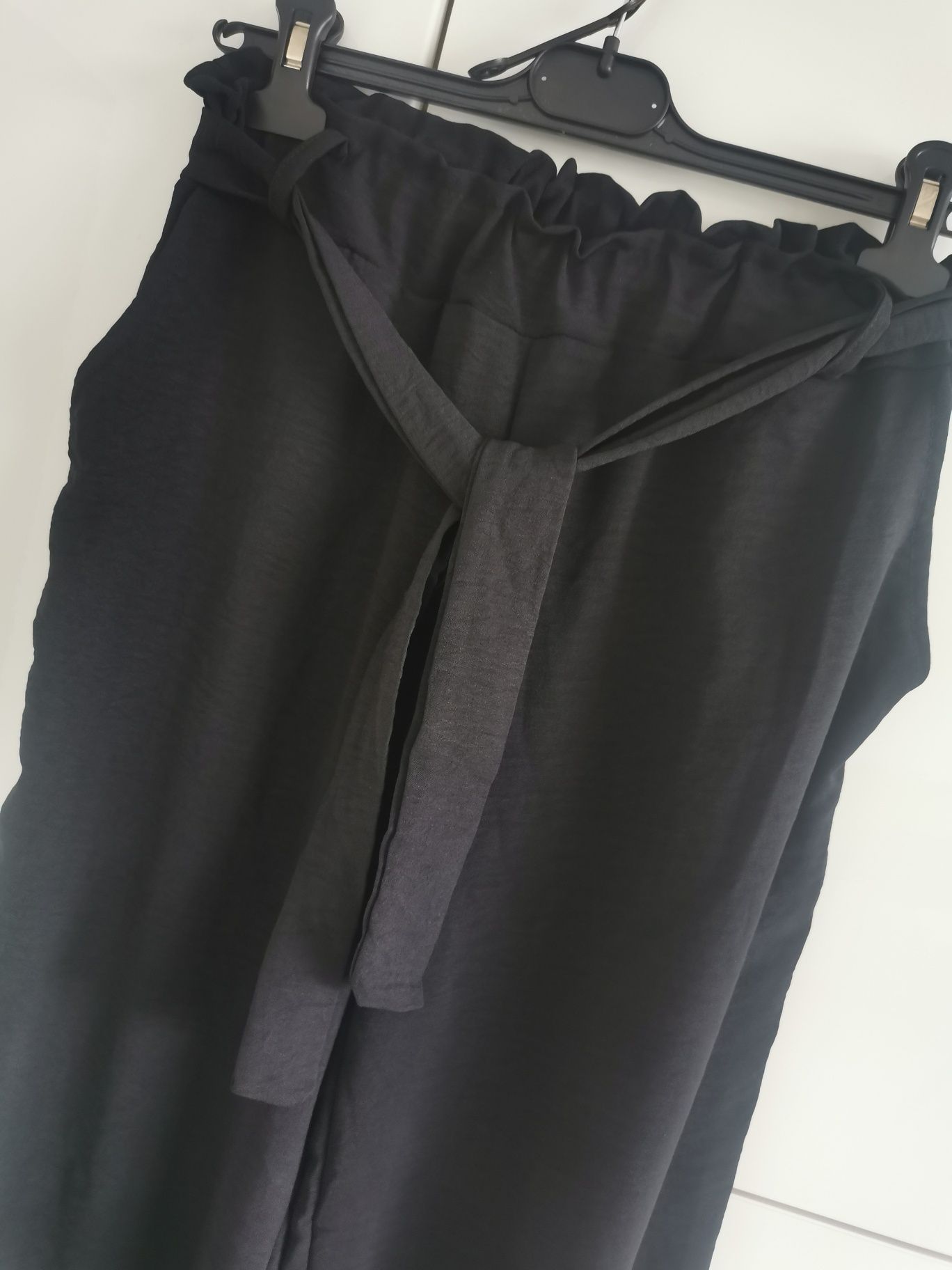 Moda Italy UNI piękne czarne zwiewne spodnie szerokie