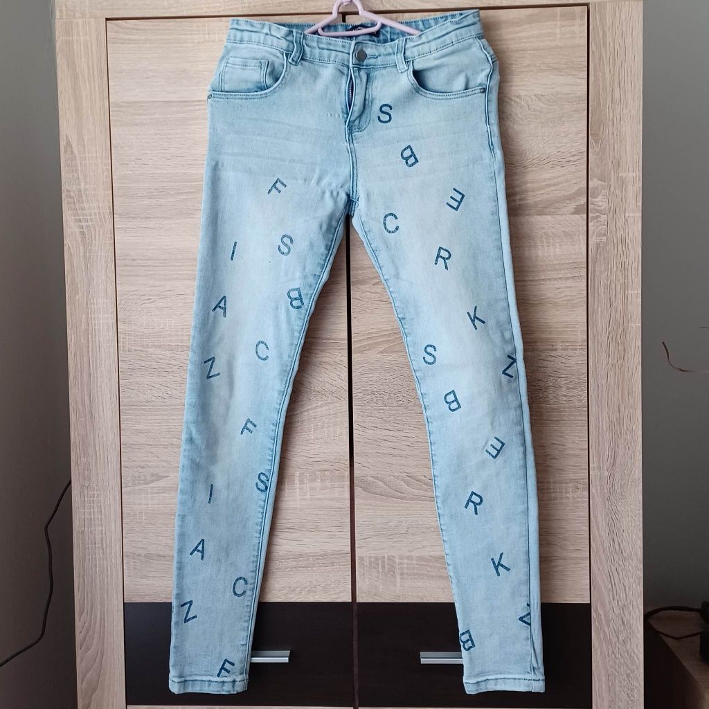 Jeansy jasnoniebieskie dziewczęce r. 158, Reserved