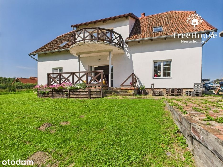 Dom na Mazurach, z agroturystyką przy jeziorze.
