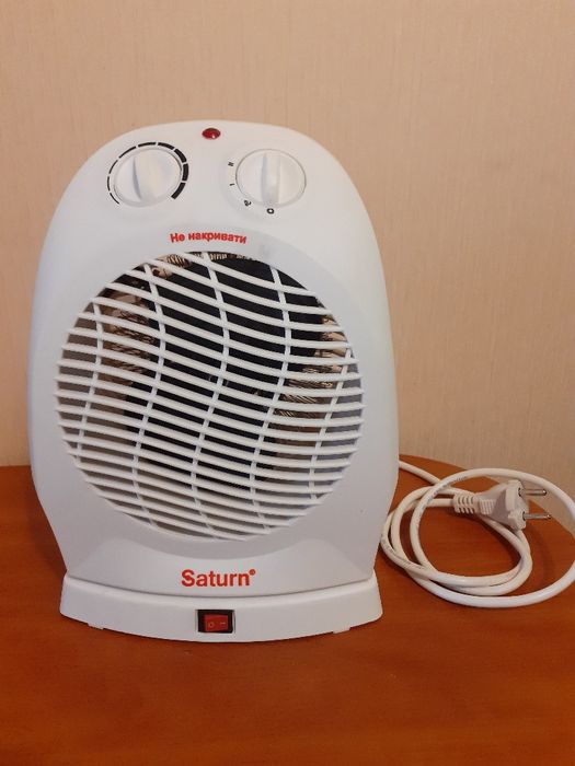 Тепловентилятор поворотный новый