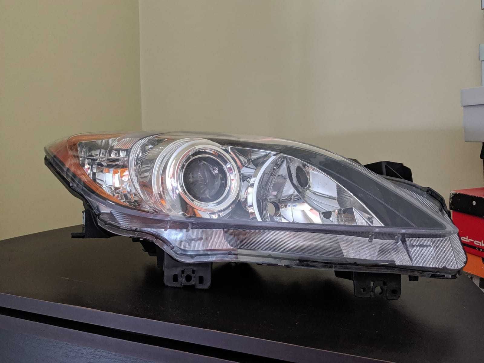 Farol/Ótica Mazda 3 (BL) (Lado DIREITO) - LER c/ ATENÇÃO!