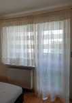 Firany w kremowej tonacji - okno i balkon