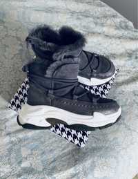 Шкіряні зимові кросівки ботинки угги на масивній підошві цигейка