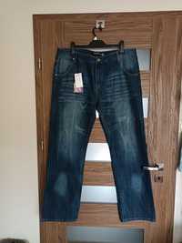 Nowe spodnie jeans 101-103 pas.