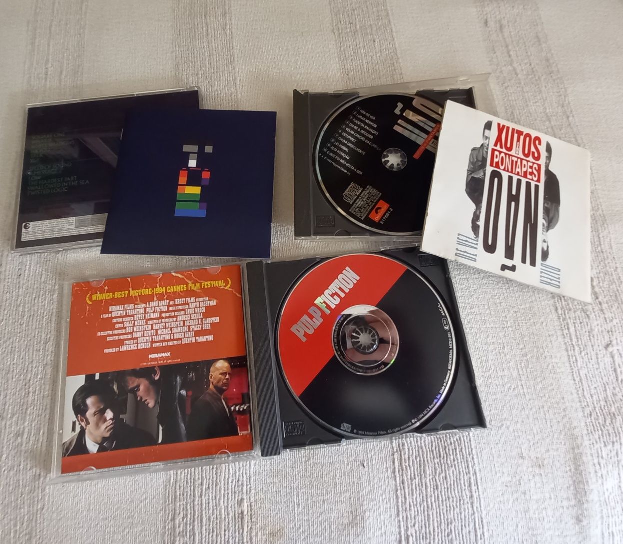 Três cds por oito euros. Xutos Coldplay Pulp Fiction