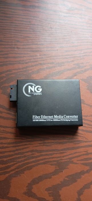 МедиаконвертерNG OPTICS950GS-//20A дешевле некуда налетай, чёрная пятн