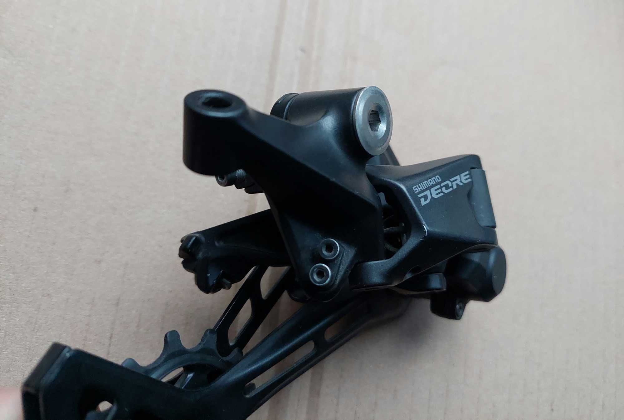 Задній перемикач Shimano Deore RD-M5100 Shadow+,перекидка,mtb.