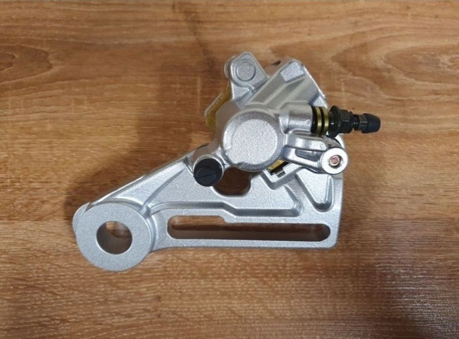 Zacisk hamulcowy tyl  ktm exc tpi 250, 300,125 sxf husqvarna gas gas