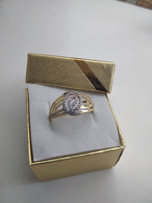 Złoty elegancki pierścionek z cyrkoniami złoto 585 rozmiar 18 995