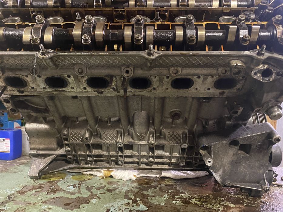 Двигун м52б28TU