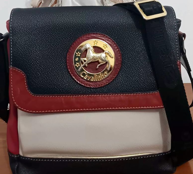 Mala tira colo nova da  cavalinho