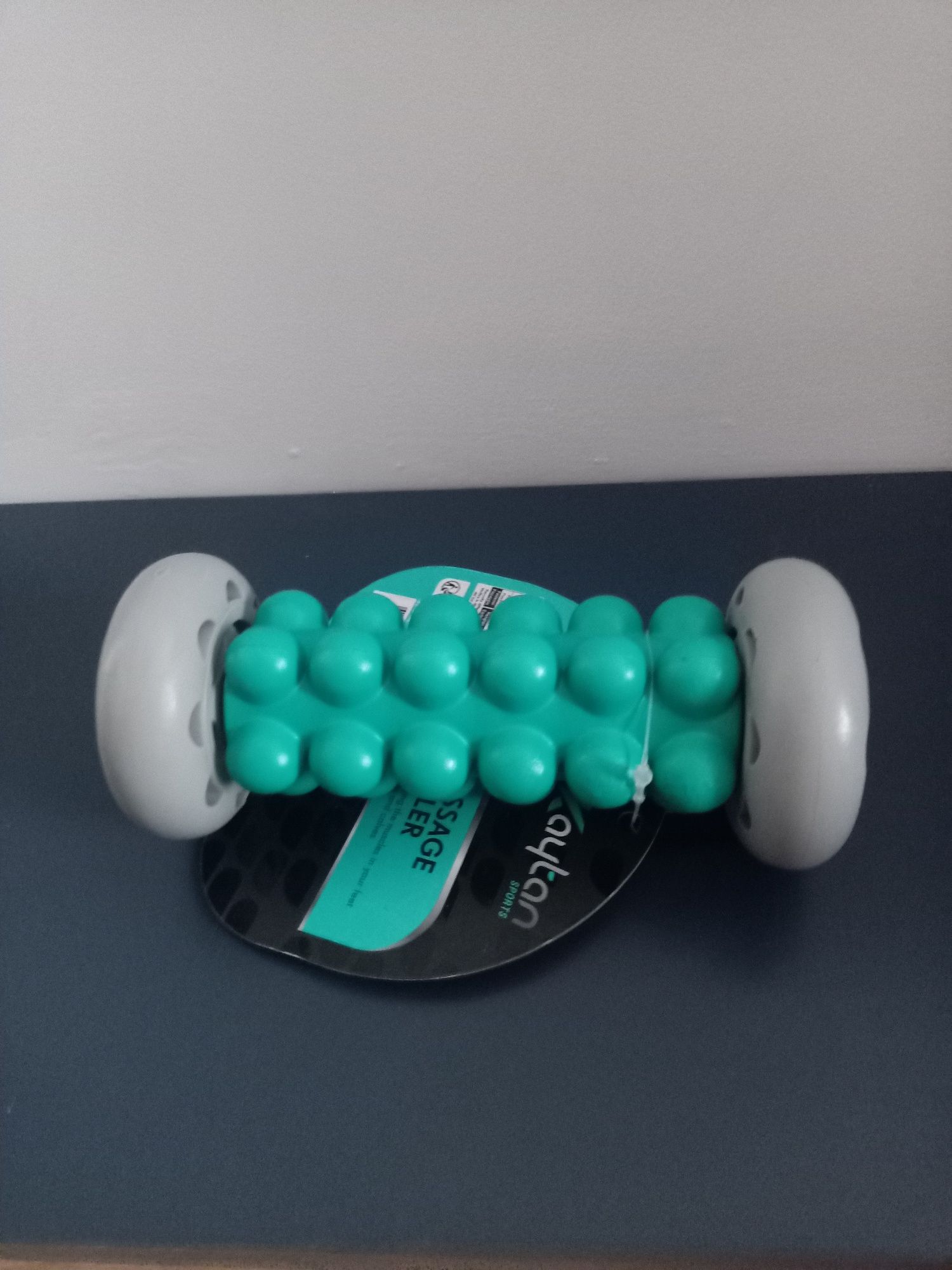 Wałek z wypustkami Kaytan 16,5cmx7cm srebrno-turkusowy masażer roller