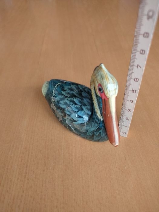 Conjunto de patos em madeira.