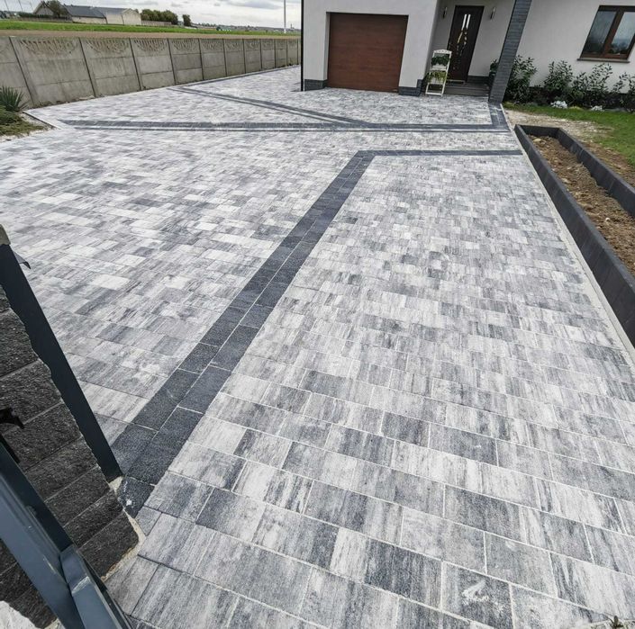 Układanie kostki brukowej i montaż ogrodzeń