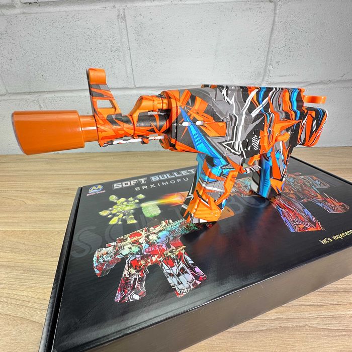 Автомат іграшковий (стріляє орбізами, на акумуляторі) 9910