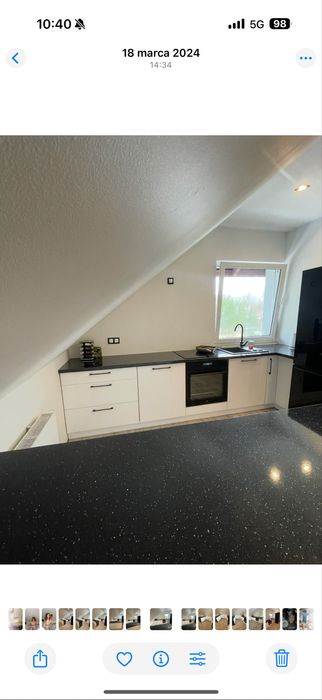 Kuchnia na wymiar z wyspą–nowoczesna,czarno-biała, z brokatowym blatem