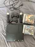 PS3 + 2 comandos originais + 2 comandos originais IMove + 16 jogos