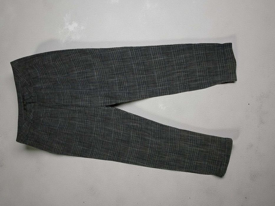 Жіочі брюки в клітинку