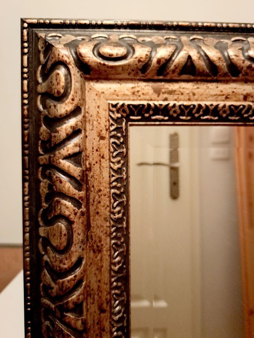 Stylowe lustro fazowane z ozdobną ramą 48cm x 118cm.