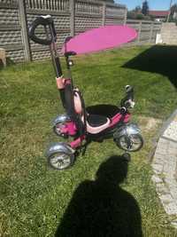 Rower dla dziecka trzykołowiec, z szelkami i uchwytem do prowadzenia