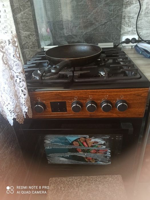 Кухонная плита с духовкой комбинированная