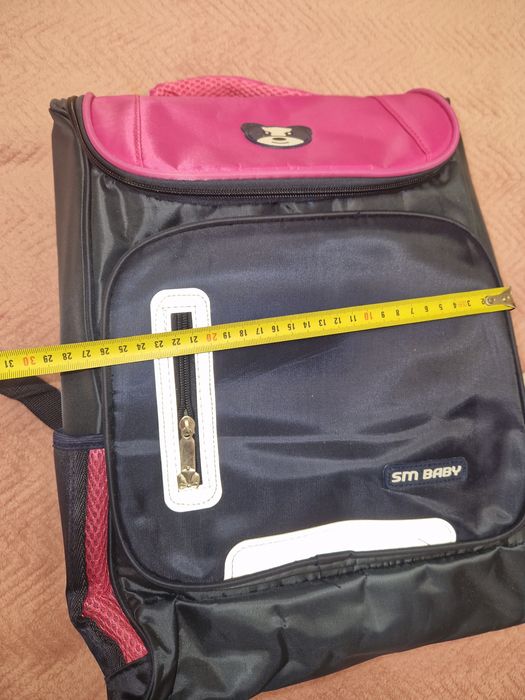 Новий портфель для дівчинки молодших класів