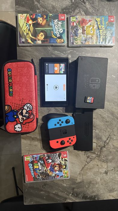 Sprzedam Nintendo Switch. Zestaw, gry, Etui mario