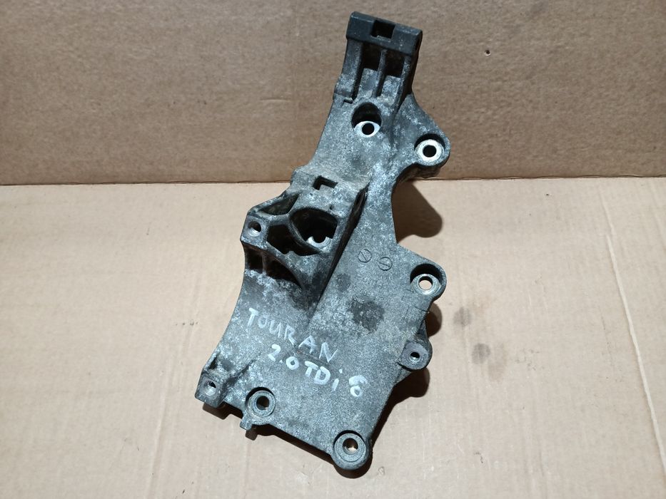 Łapa mocowanie alternatora pompy kompresora 2.0 TDI VW Audi Seat Skoda
