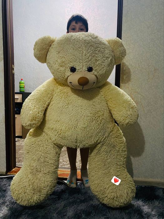 плюшевый мишка белого цвета