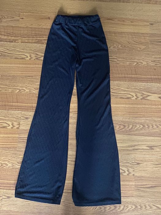 Штаны клеш в рубчик женские