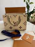 Louis Vuitton White Empreinte Onthego