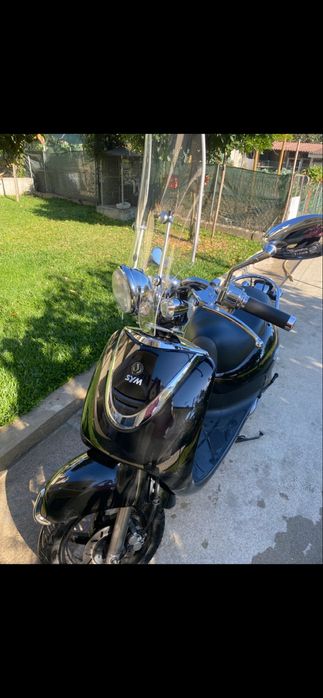 Vedo moto 125 como nova e bem estimada